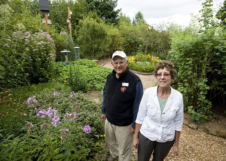 Meredith Hardin, right, and Brigg Franklin are two members of a dedicated volunteer force that maintains the Wildlife Botanical Gardens in Brush Prairie.