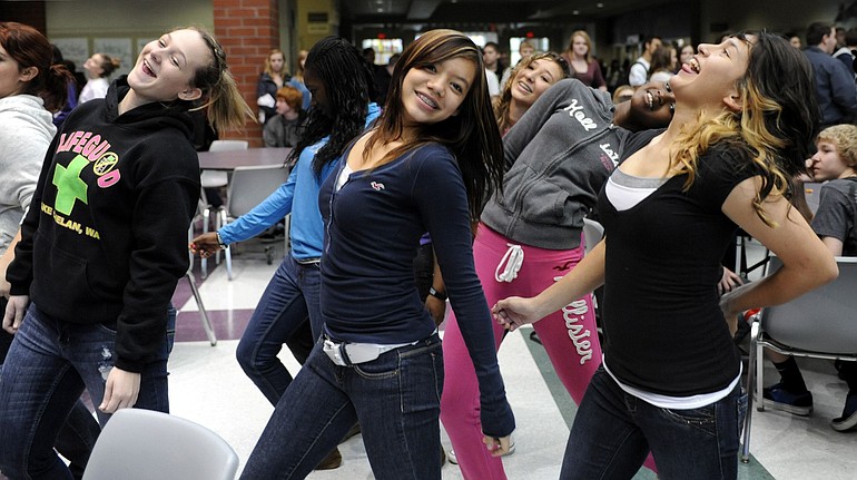 Heritage High School dance students with Jerica Pinard, center, is part of a &quot;flash mob&quot; performance of Michael Jackson's &quot;Thriller&quot; during lunch Friday. It was a promotion for Saturday's 7 p.m.