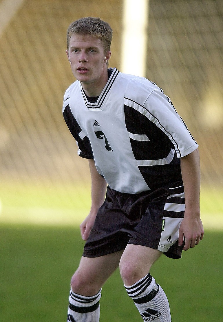 Austin Luher playing soccer at Evergreen in 2001.