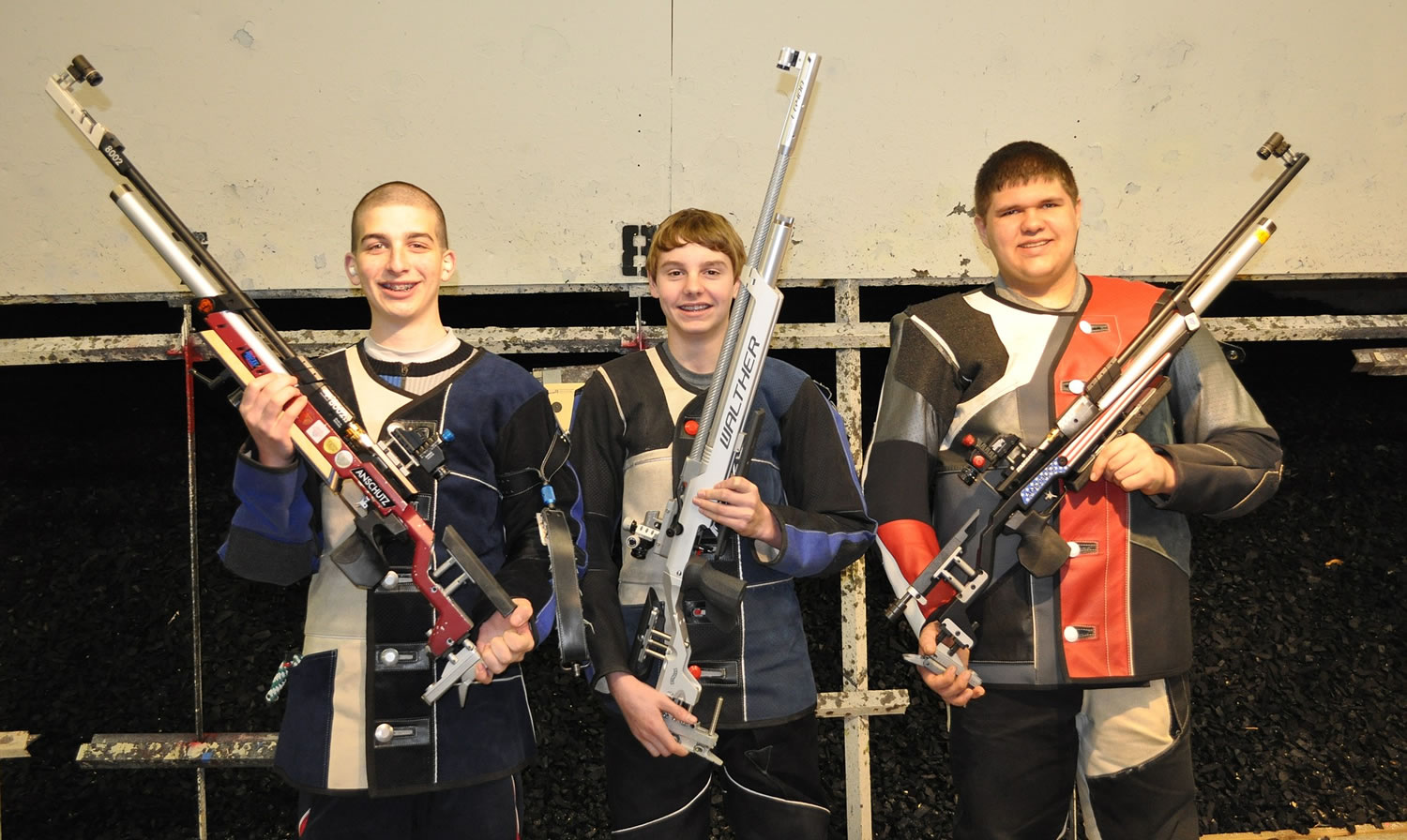 Qualifying in air rifle for the USA Shooting National Junior Olympic Championships were (from left) Casper Schadler, 15, Tyler Horn, 13, and Kyle Ueltschi, 18.