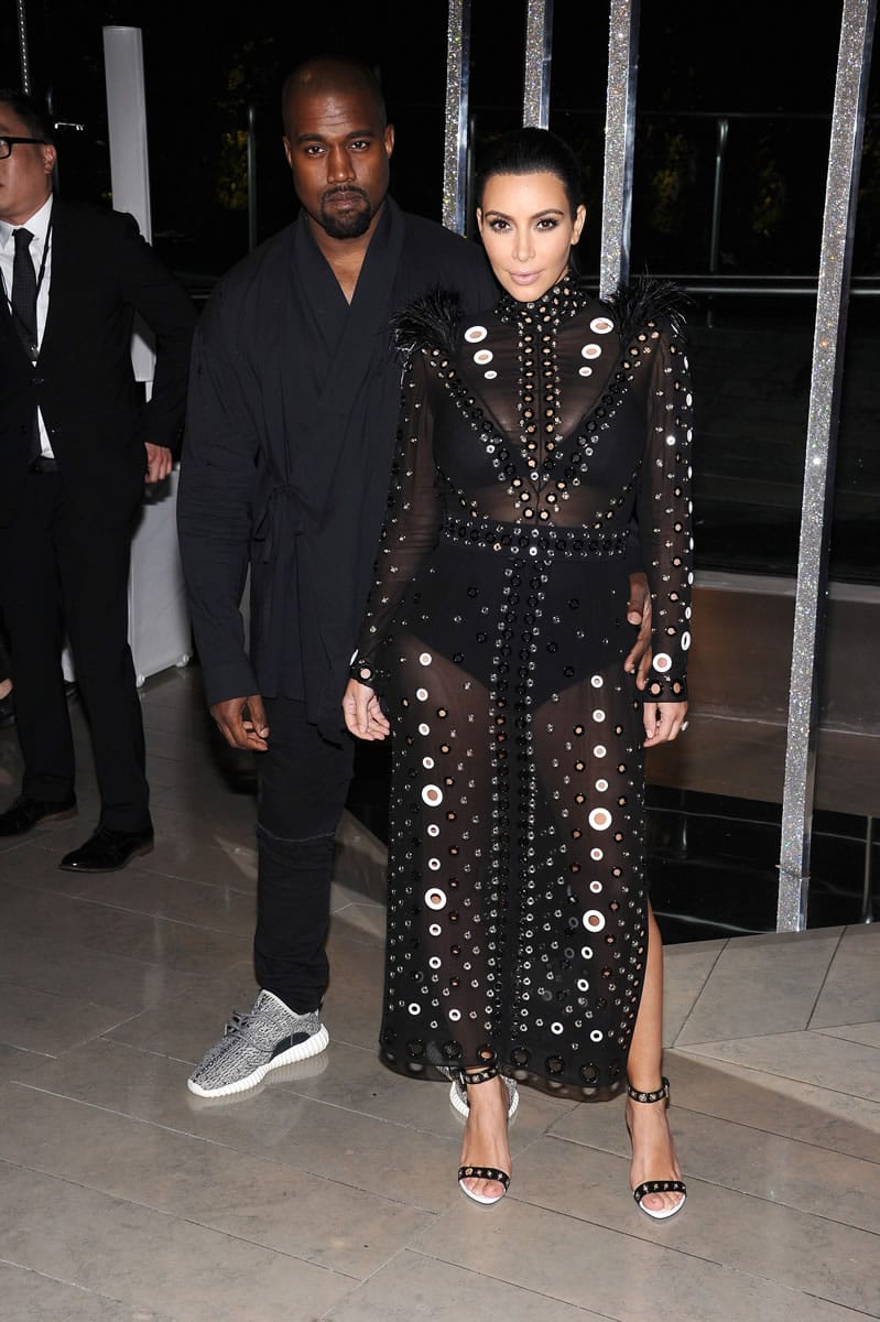 Kanye West, left, and Kim Kardashian attend the 2015 CFDA Fashion Awards at Alice Tully Hall on Monday in New York.