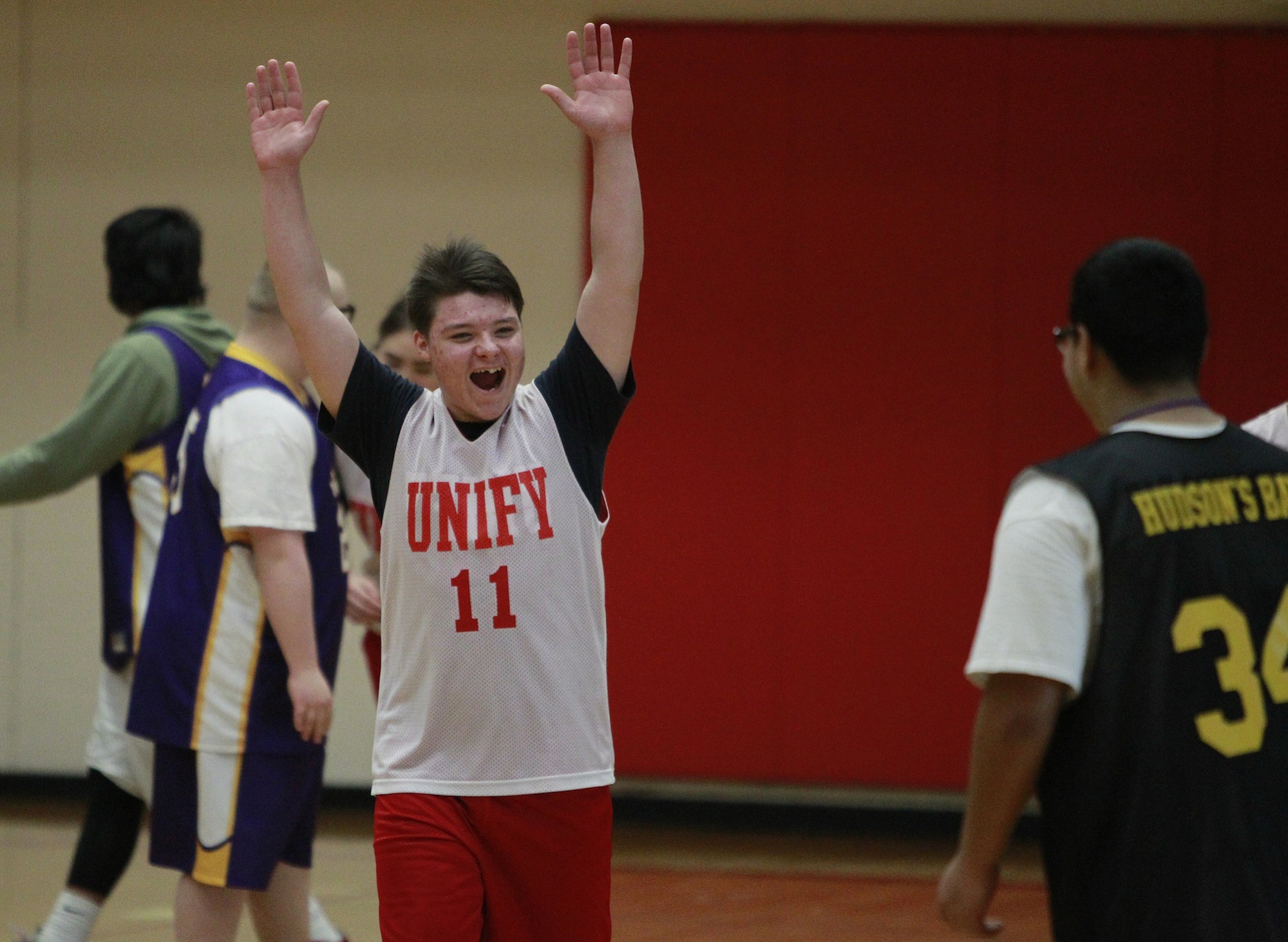 Fort Vancouver Unified player Kristian Storm celebrates a made basket.
