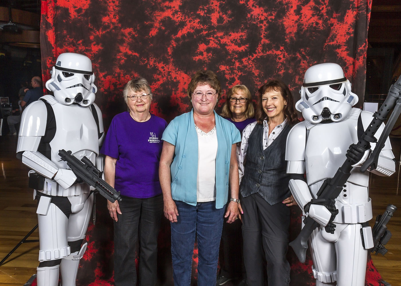 Fisher's Landing East: Ellen Schroder, from left, Jan Berg, Sandi Long, Diane Stevens with Stormtroopers at a fundraiser for Furry Friends on May 16.