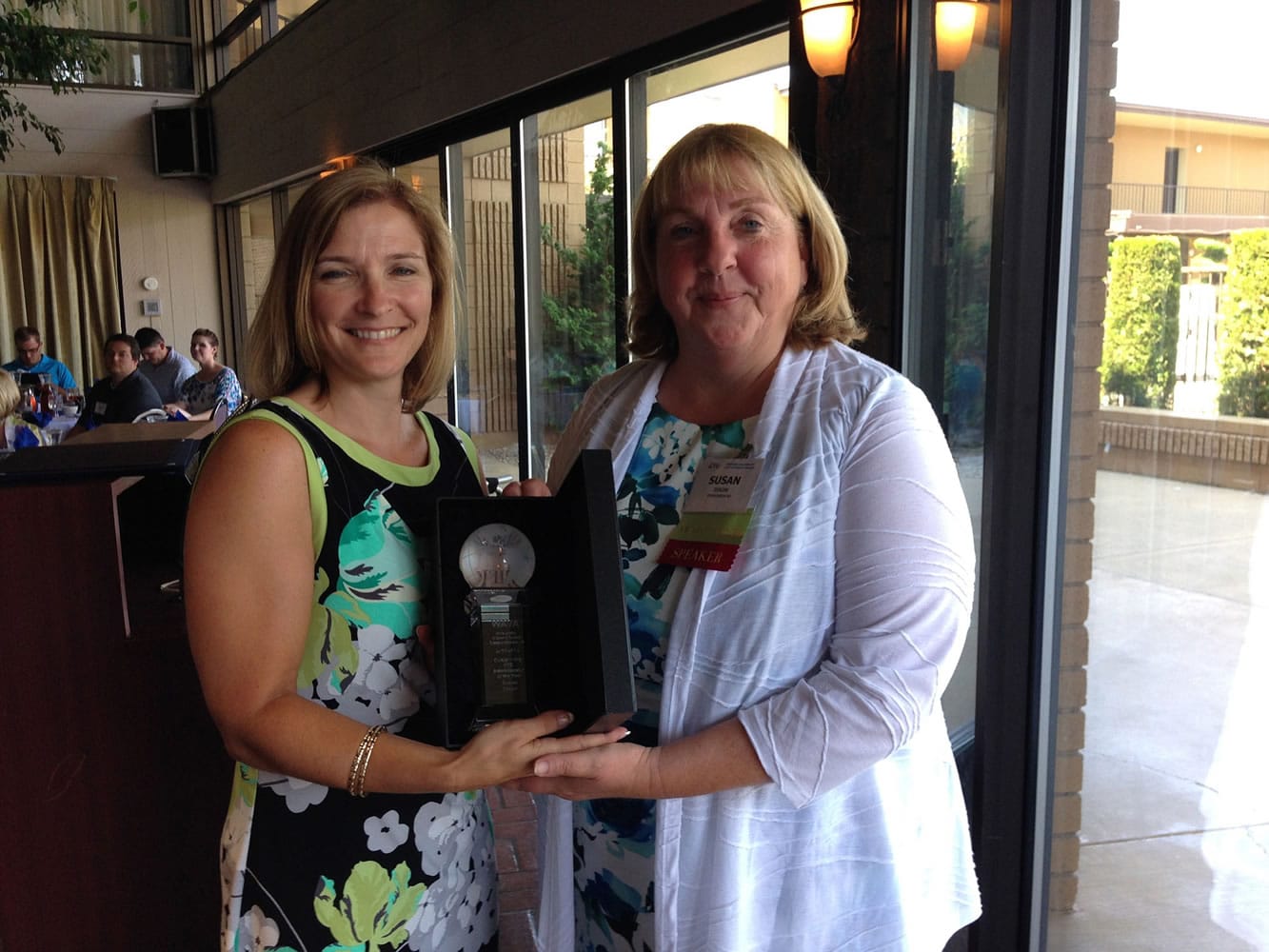 Landover-Sharmel: Evergreen Public Schools College, Career and Technical Education Director Susan Dixon, right, is named &quot;Administrator of the Year&quot; on Aug.
