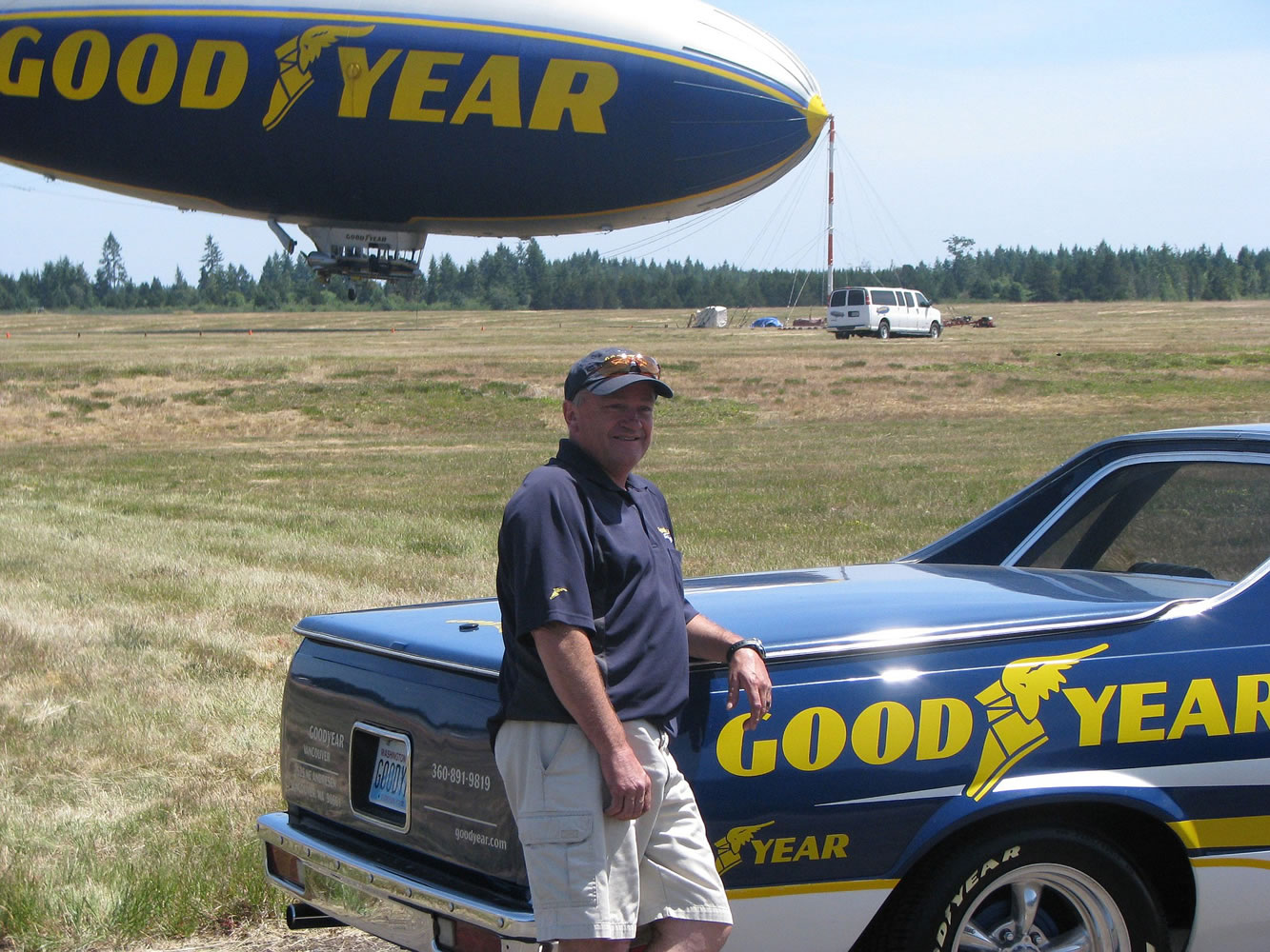 Vancouver Tire owner Gordon Bozarth with his Goodyear-inspired Chevrolet El Camino in Shelton on June 16, when he got to ride the blimp with his grandson, Carter Ziemer.