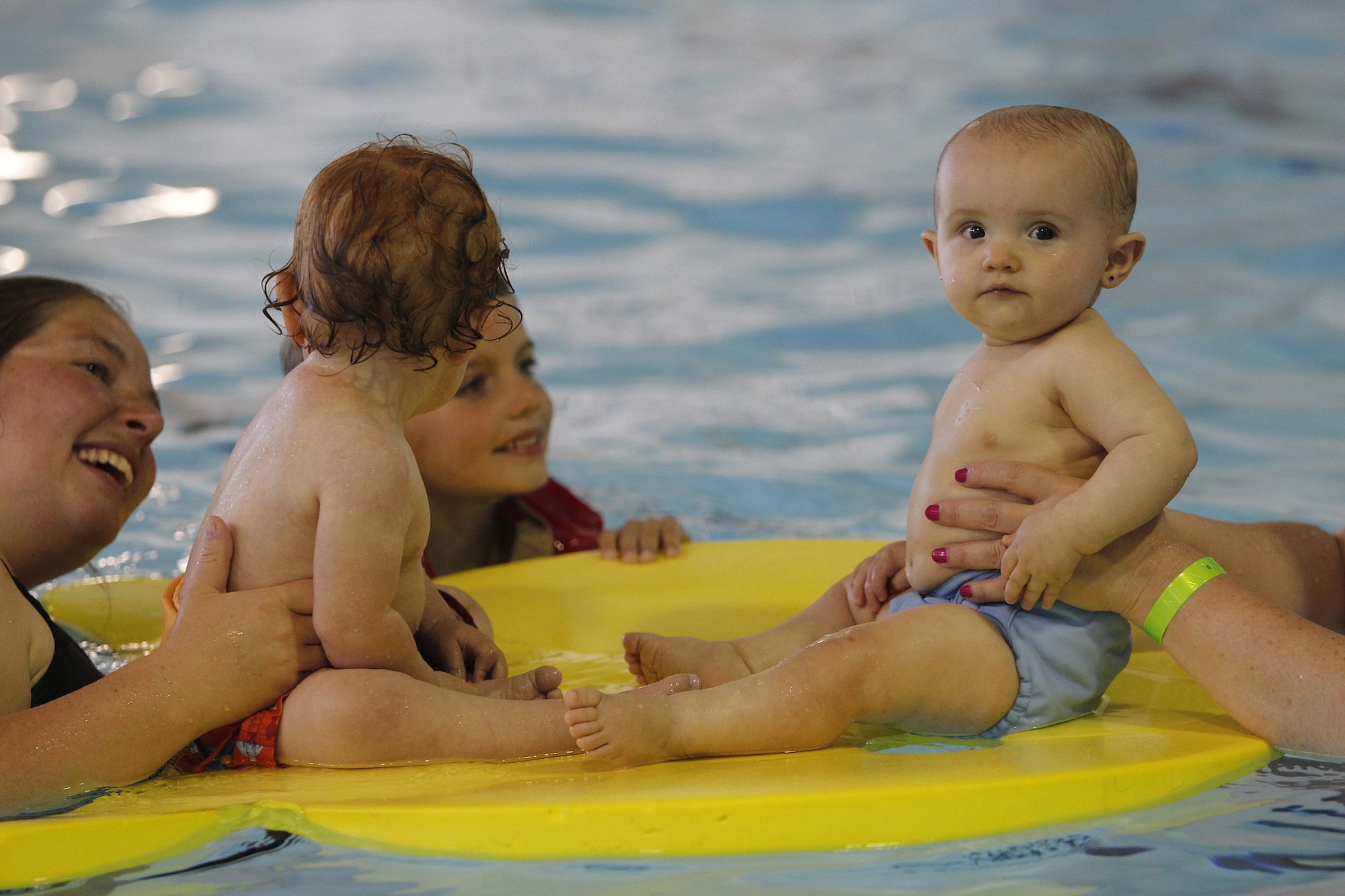 Kayleigh Leonetti, 1, right, enjoys the Marshall Community Center pool with family.