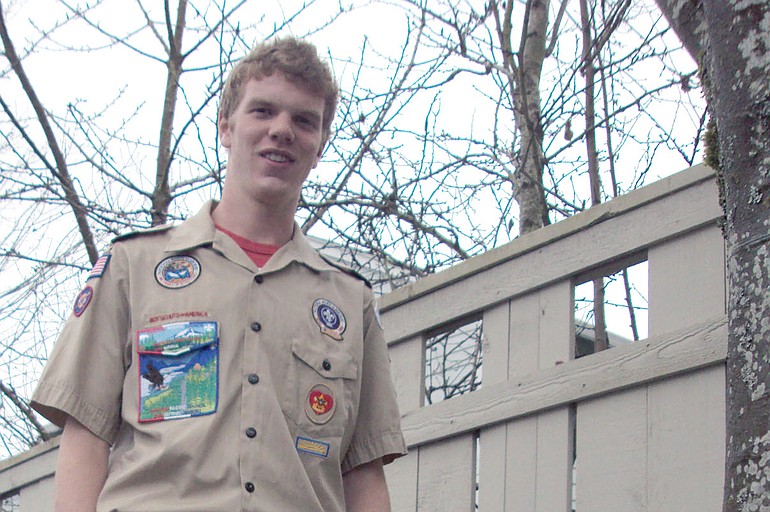 John Cummings, 16, dedicated his Eagle Scout project to drumming up money and volunteers to make and distribute 1,000 of these signs for Saturday's Walk &amp; Knock.
