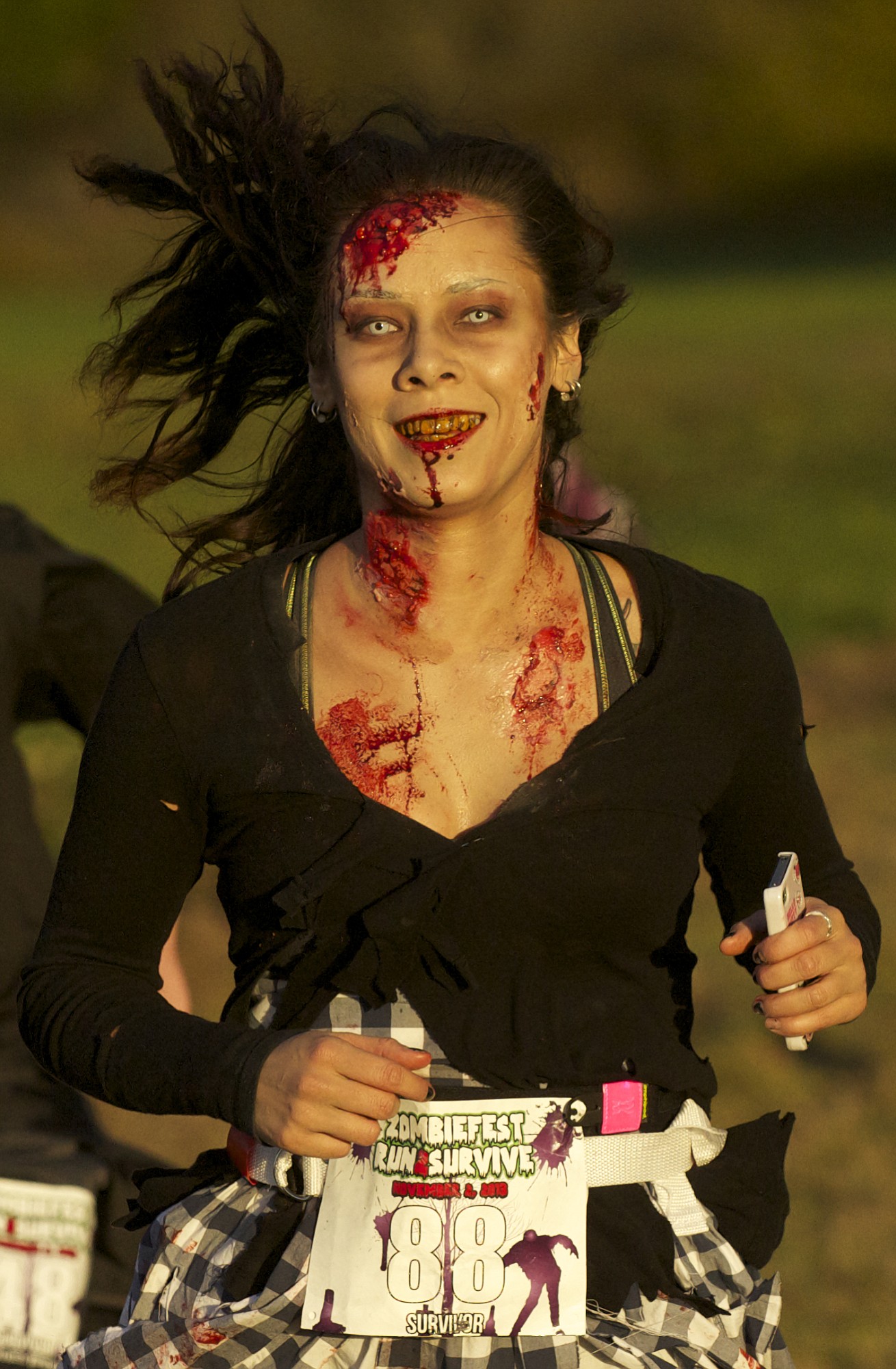 Marilyn Tycer, 28, of Vancouver said her spooky-looking contact lenses blurred her peripheral vision during the Run2Survive race Saturday.