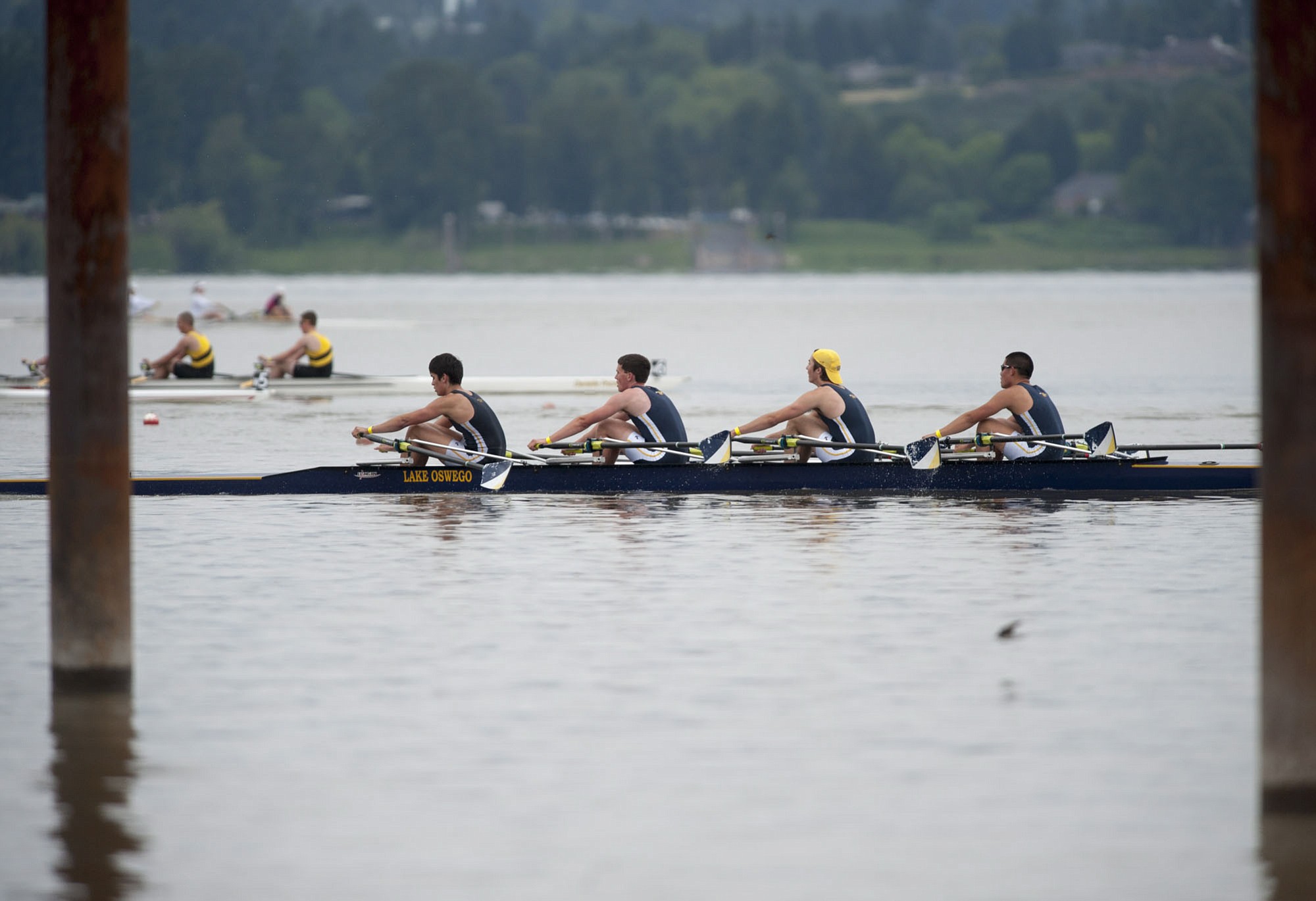 Crews teams row in races Friday on Vancouver Lake as part of the Pacific Northwest championships.