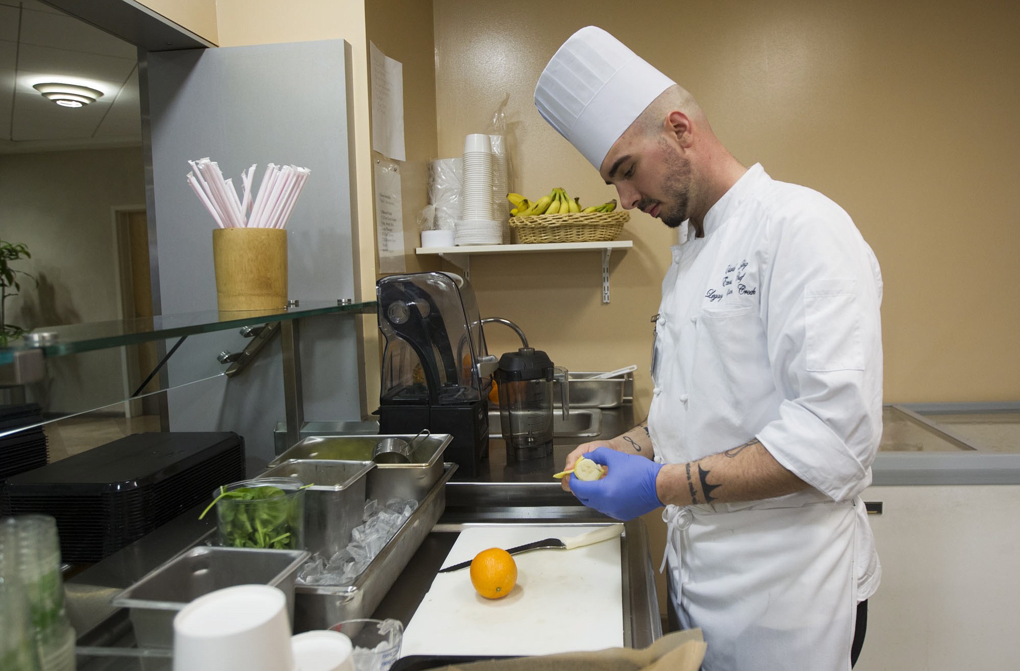 Executive chef Edward Helbig makes a fruit smoothie at the Terrace Caf? inside Legacy Salmon Creek Medical Center in Vancouver. The smoothies are part of a larger effort to offer healthier menu items.