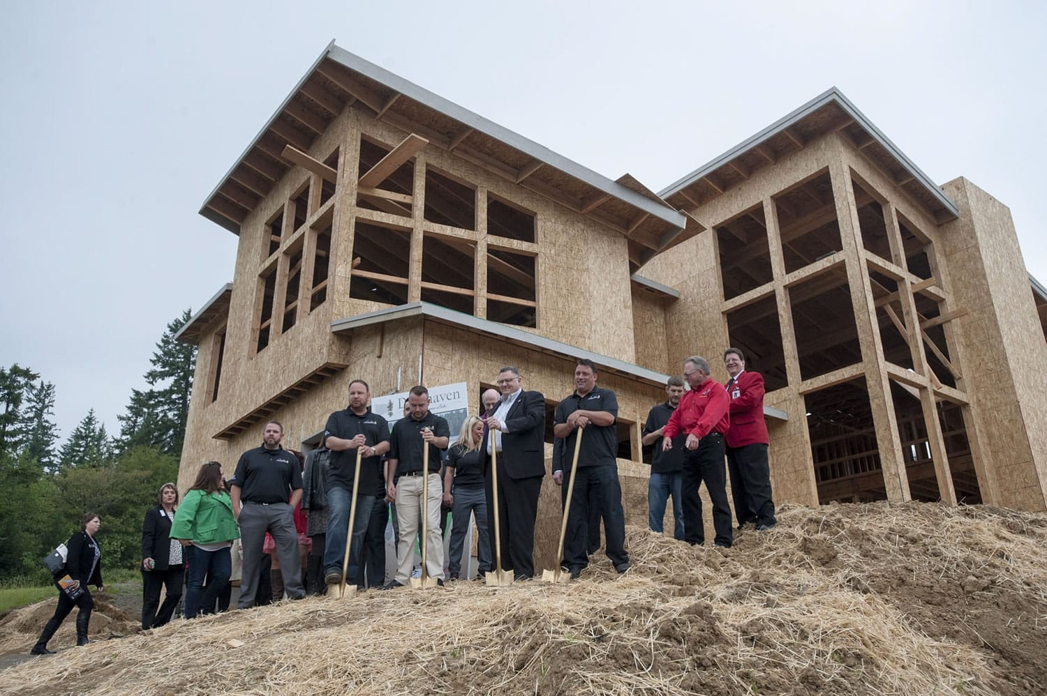 Visitors mark the ground-breaking Thursday for the Deerhaven subdivision of luxury homes in the north shore area of Lacamas Lake in Camas, where development is beginning after a major annexation by the city and years of planning.