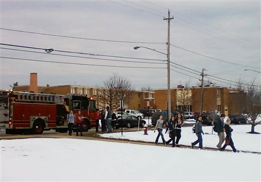 People are evacuated from Chardon High School in Chardon, Ohio, about 30 miles east of Cleveland, after a number of students were shot there at the beginning of the school day Monday, Feb. 27, 2012.