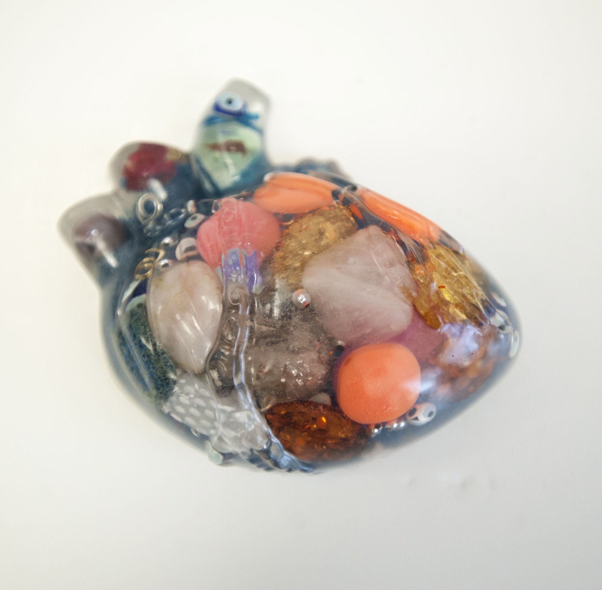 Laura Velarde put jewelry-making leftovers into an anatomically correct heart-shaped gelatin mold and filled it with resin.