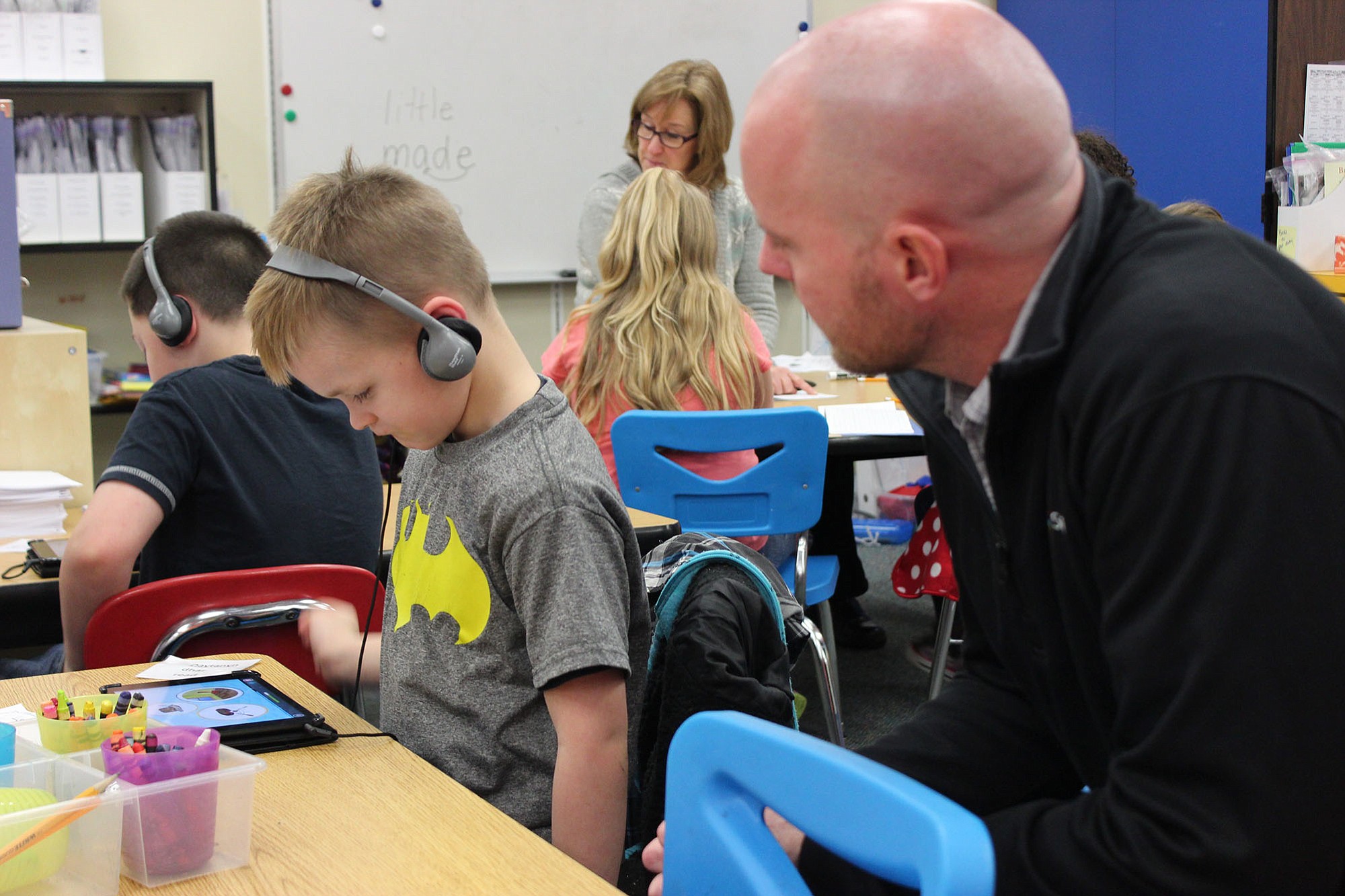 North Image: First-grade classes at North Image Elementary School received a donation of four iPad Minis from civil engineering firm MacKay Sposito, which the school will use as part of its reading program.