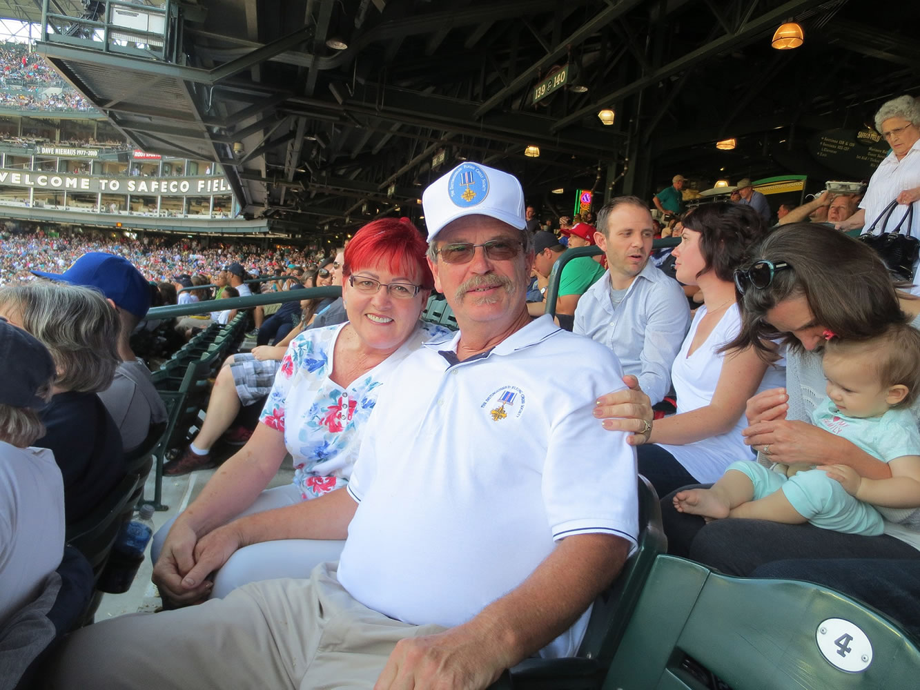 Clark County: Floreen and Dave Clark at a Seattle Mariners game on July 12, where Vietnam veteran Dave Clark was honored before the game as part of a tribute to the Distinguished Flying Cross Society.