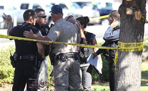 Emergency personnel respond to a shooting at an IHOP restaurant in Carson City, Nev. on Tuesday, Sept. 6, 2011. Seven people were wounded after a gunman opened fire at the restaurant, authorities said.