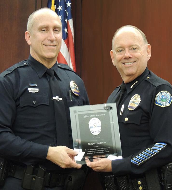 Battle Ground: Battle Ground Detective Philip Anderson, left, and Police Chief Bob Richardson at the March 16 city council meeting, where Anderson was named Officer of the Year.