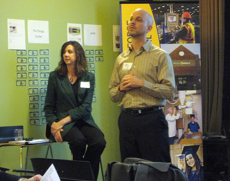 Lynn Elise Farmer, left, coached entrepreneurs on the art of the elevator pitch at PubTalk on Wednesday.