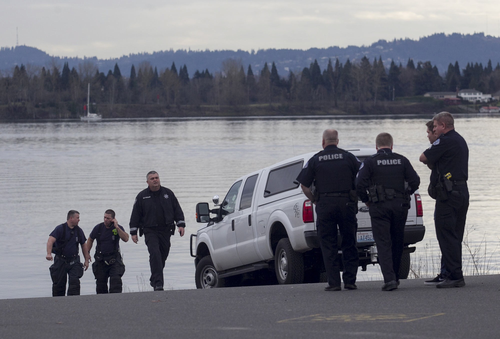 A woman was treated at the scene after she apparently intentionally drove her car into the Columbia River this afternoon at the Marine Park boat launch in Vancouver.
