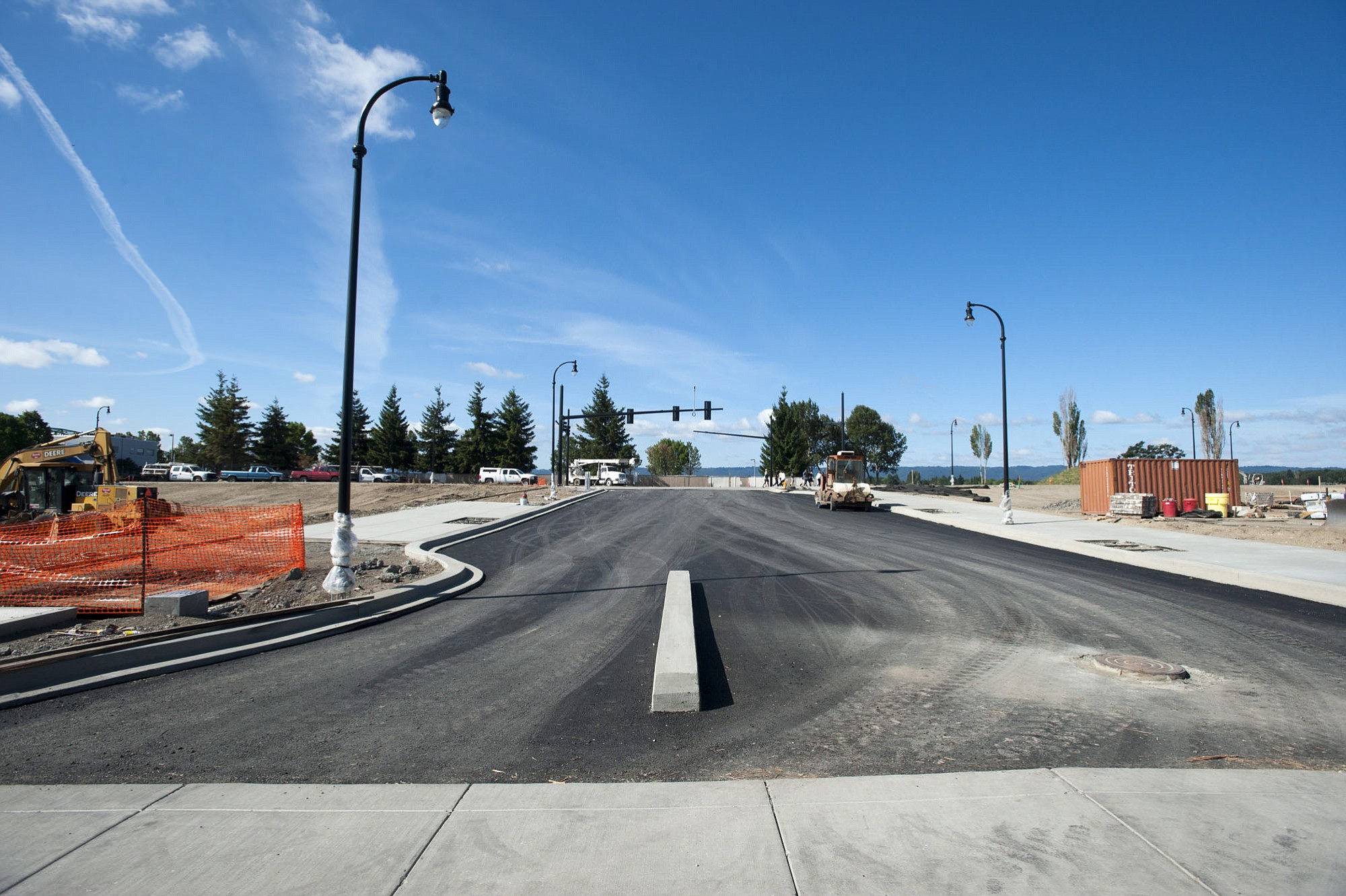 The roads, curbing and utilities in the $1.3 billion Columbia River waterfront redevelopment project are in place, and over the next few weeks, workers will finish installing streetlights and traffic signals, pouring the rest of the sidewalks and planting landscaping.