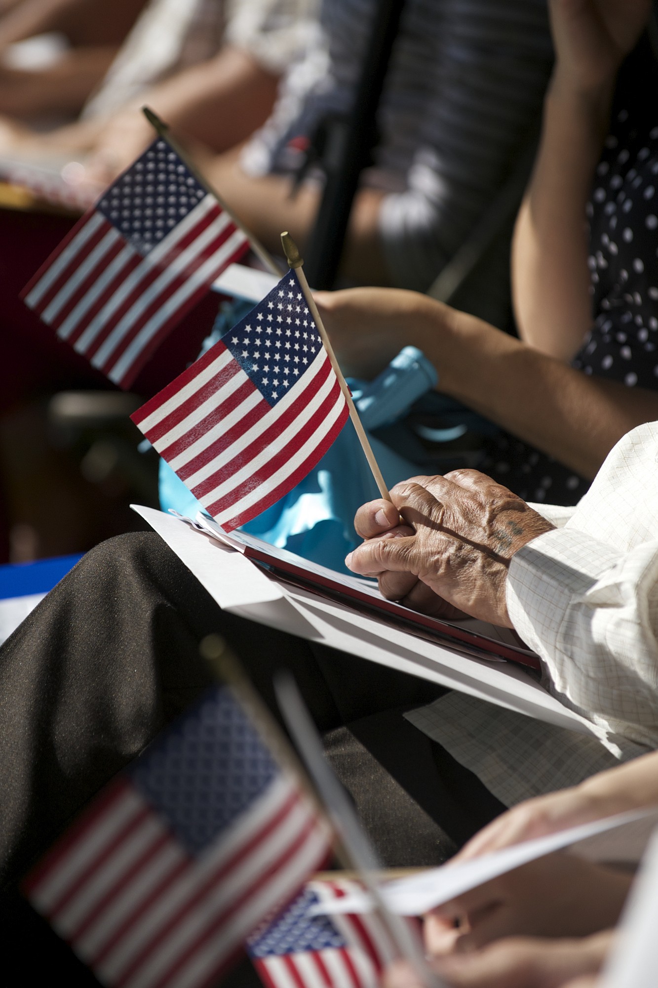 New flags were handed out to 33 new citizens Friday during a ceremony at the Fort Vancouver National  Historic Site.