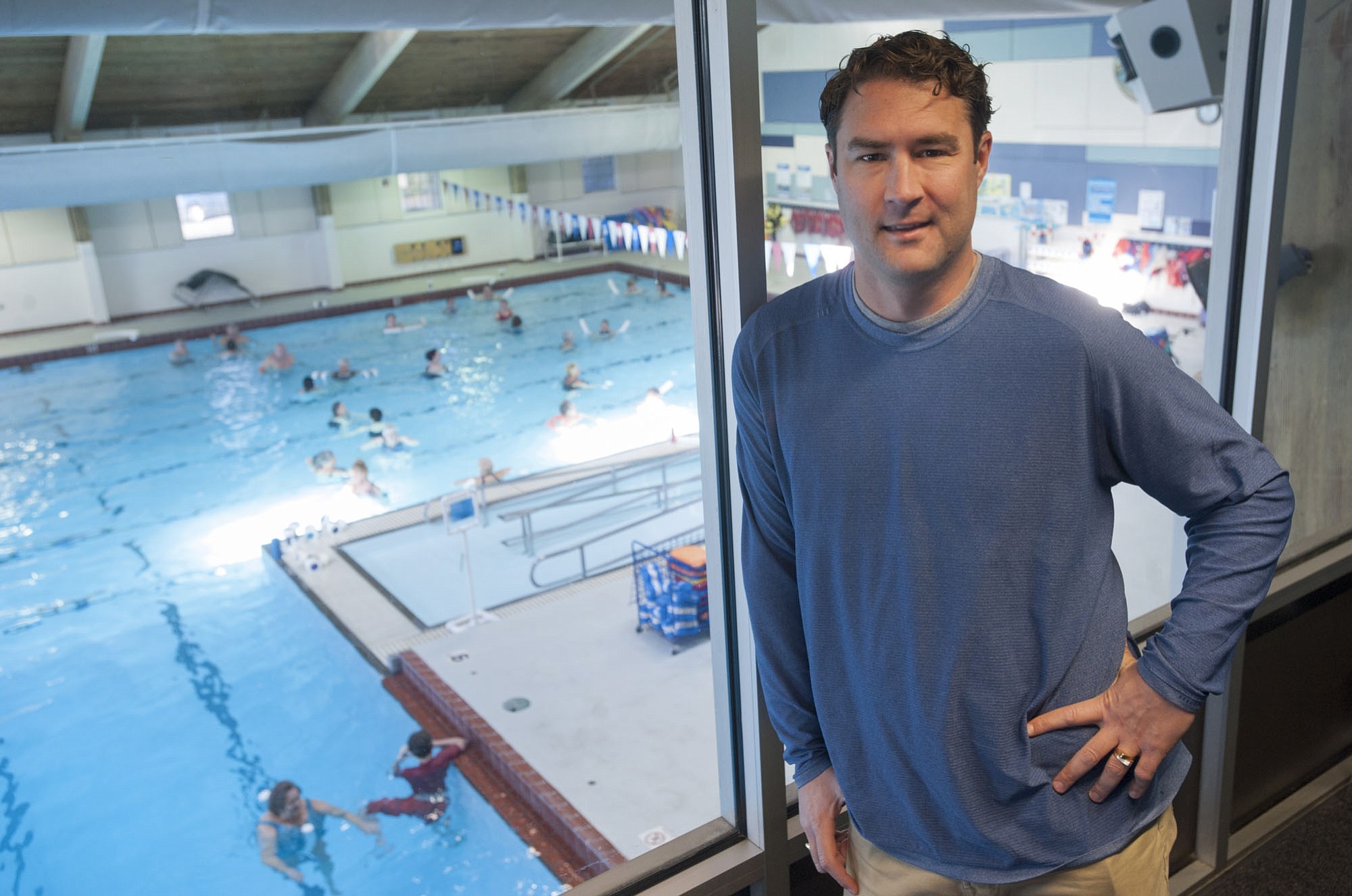 Vancouver City Councilman Bart Hansen stands in the pool observation deck area last week at the Marshall Community Center in Vancouver.