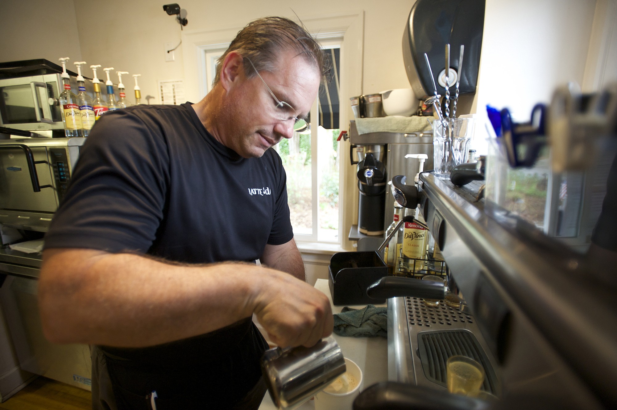Latte Da Coffeehouse and Wine Bar owner Scott Flury was a victim of vandalism last year.