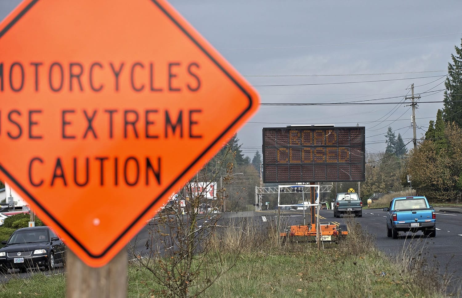 Zachary Kaufman/The Columbian
Signs are already in place warning of an all-weekend closure of Northeast St. Johns Road at the railroad crossing near Northeast 68th Street.