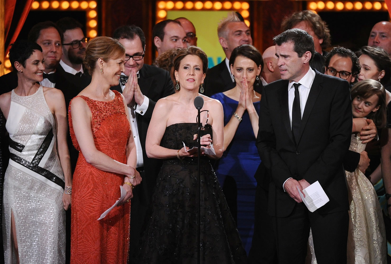 Kristin Caskey, center, along with cast and crew accepts the award for best musical for &quot;Fun Home&quot; at the 69th annual Tony Awards at Radio City Music Hall on Sunday in New York.