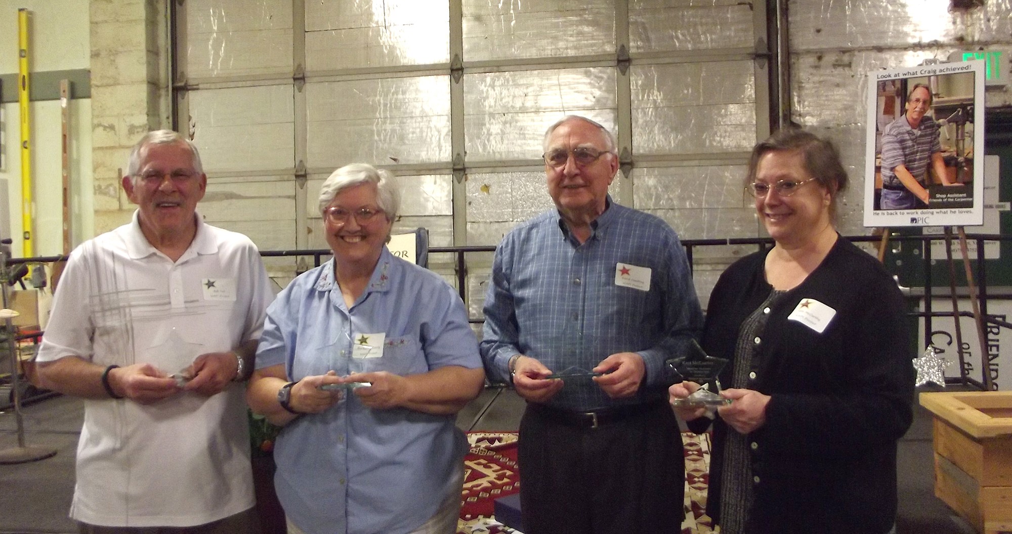 Fruit Valley: Friends of the Carpenter volunteers Bob Tait (left), Barbarita Gately, David Cambrey and Kate McCarthy were honored in April for faithfully building simple water thermometers that help people avoid waterborne diseases.
