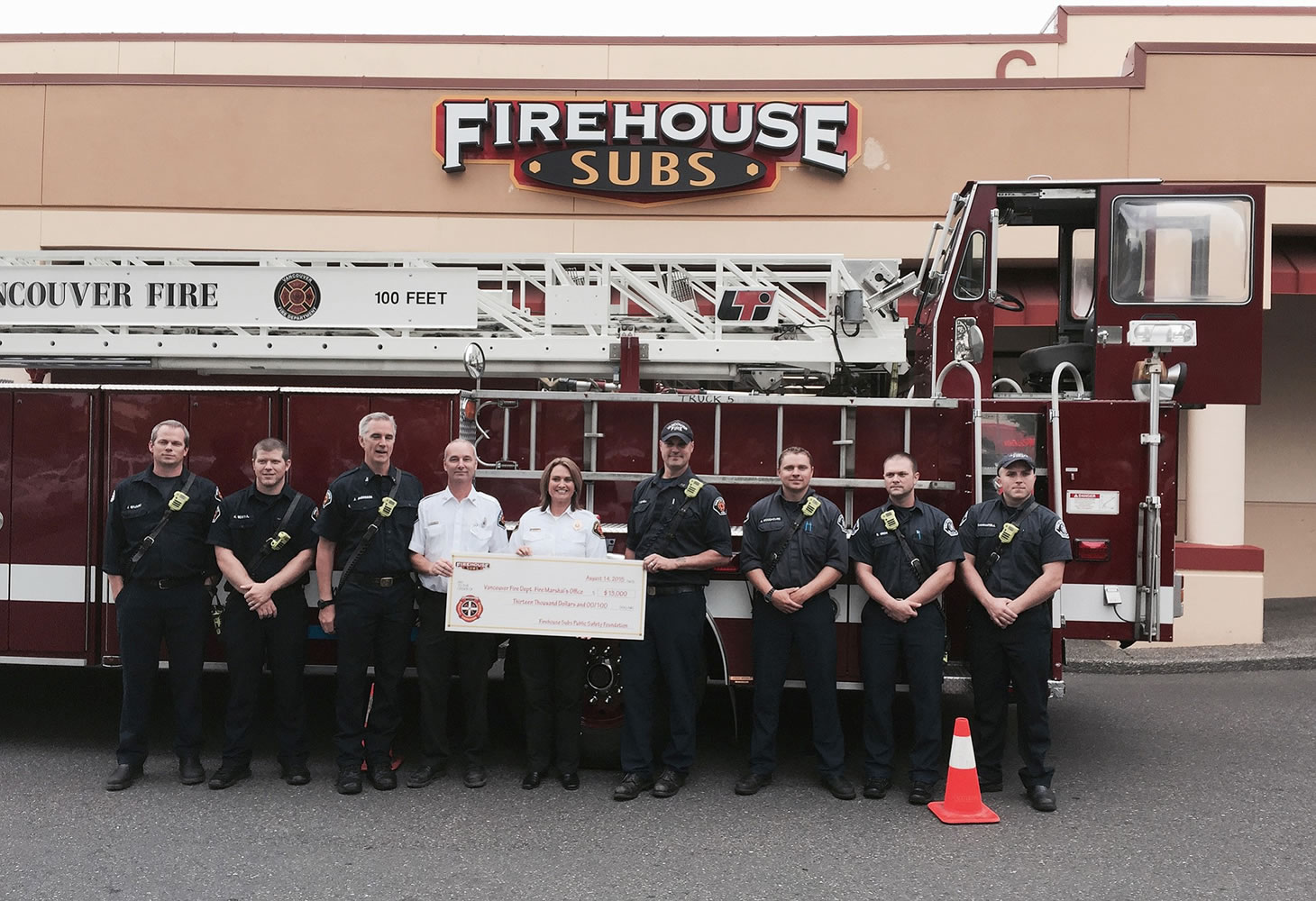 Vancouver Mall: Representatives from the Vancouver Fire Department Fire Marshal's Office accept a $13,000 grant for new tablets from the Firehouse Subs Public Safety Foundation.