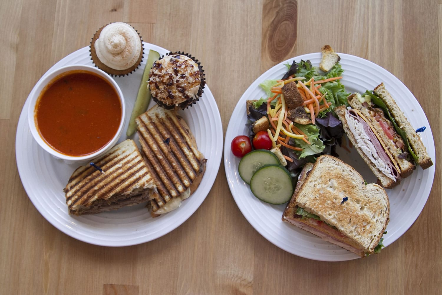 A roast beef panini, tomato basil soup and a Cafe House sandwich is served alongside chocolate coconut caramel and pumpkin pie cupcakes at the WildFlour Cafe and Cupcakes in Washougal.