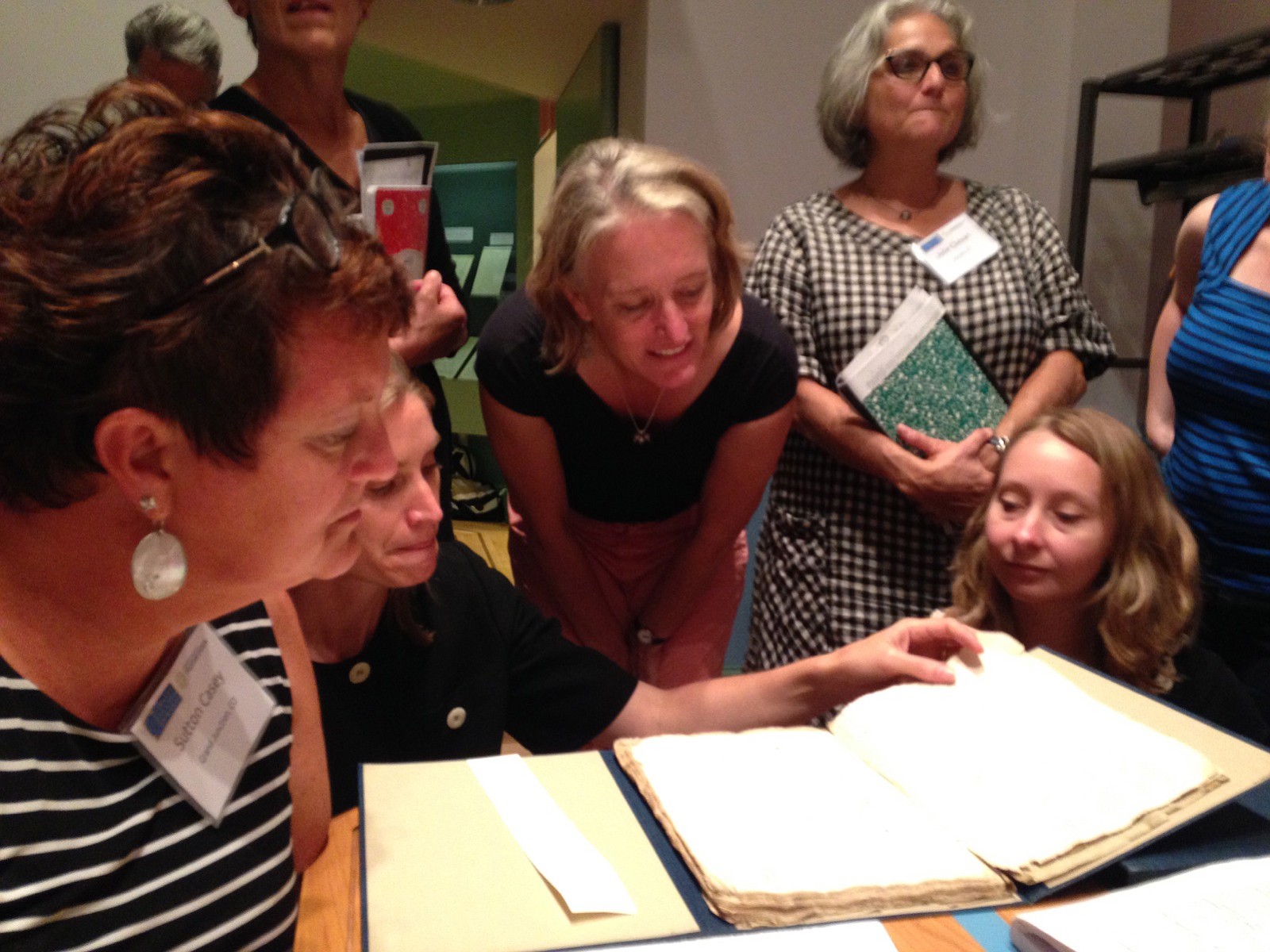 Woodland High School teacher Heather Gordon, center, got to examine a 400-year-old &quot;first folio&quot; in the Rare Books Room at Columbia University during her summer Shakespeare seminar in New York City.