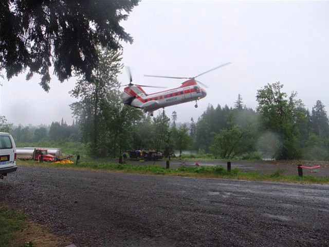 An aircraft from Columbia Helicopter gets ready to lift another load during the fish habitat project on the North Fork of the Lewis River.