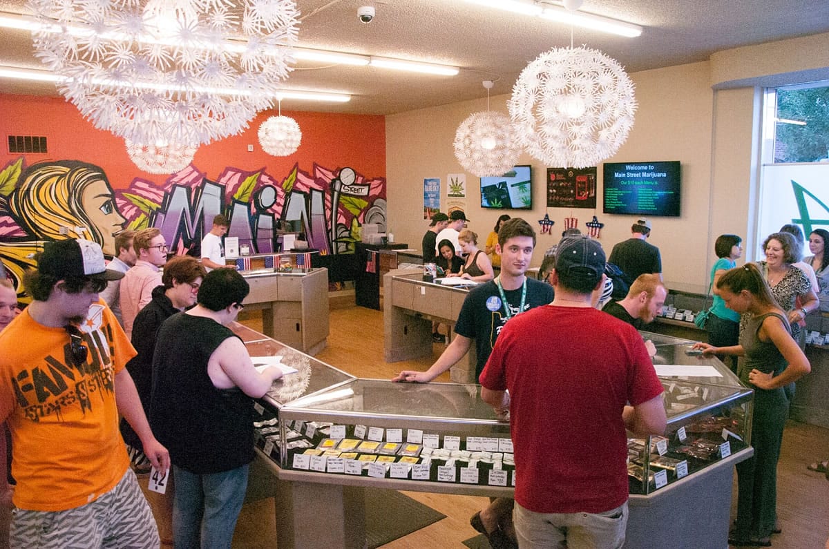 Justin Runquist/The Columbian
Customers visit Main Street Marijuana in Vancouver on Wednesday, the day recreational marijuana became legal in Oregon. Vancouver pot shops have seen an increase in business this week and suspect the change in Oregon's law has something to do with it.