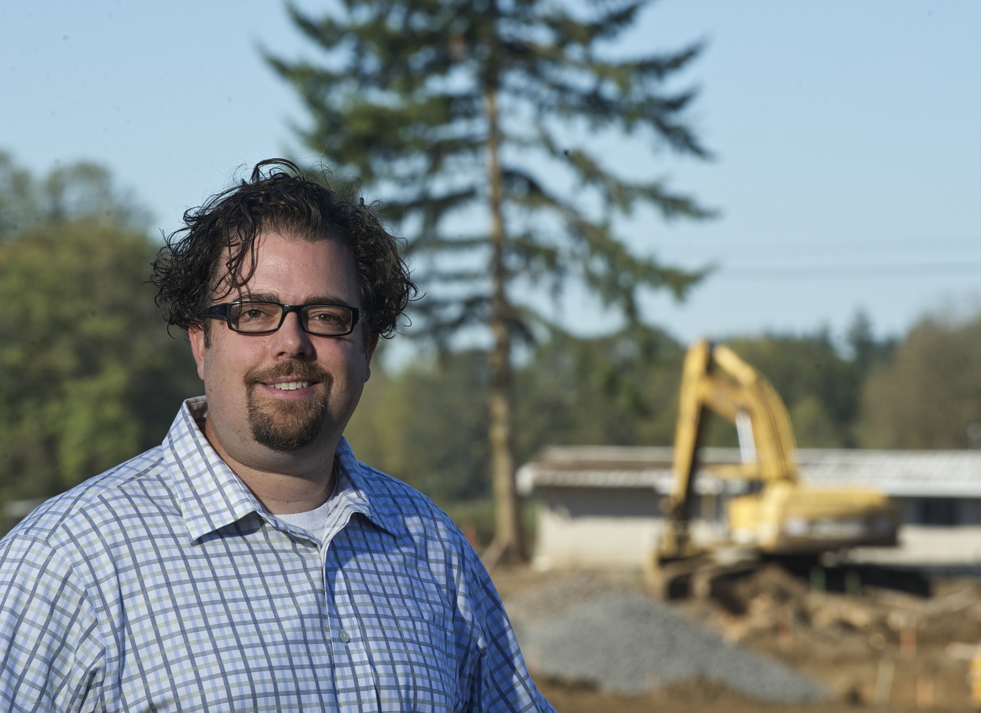 Zachary Kaufman/The Columbian
Troy Johns, owner of Urban NW Homes, at the site of his planned Urban Oaks development near Northeast 152nd Avenue and 96th Street in Vancouver. Johns purchased foreclosed subdivisions during the recession and has now is building homes throughout Clark County.