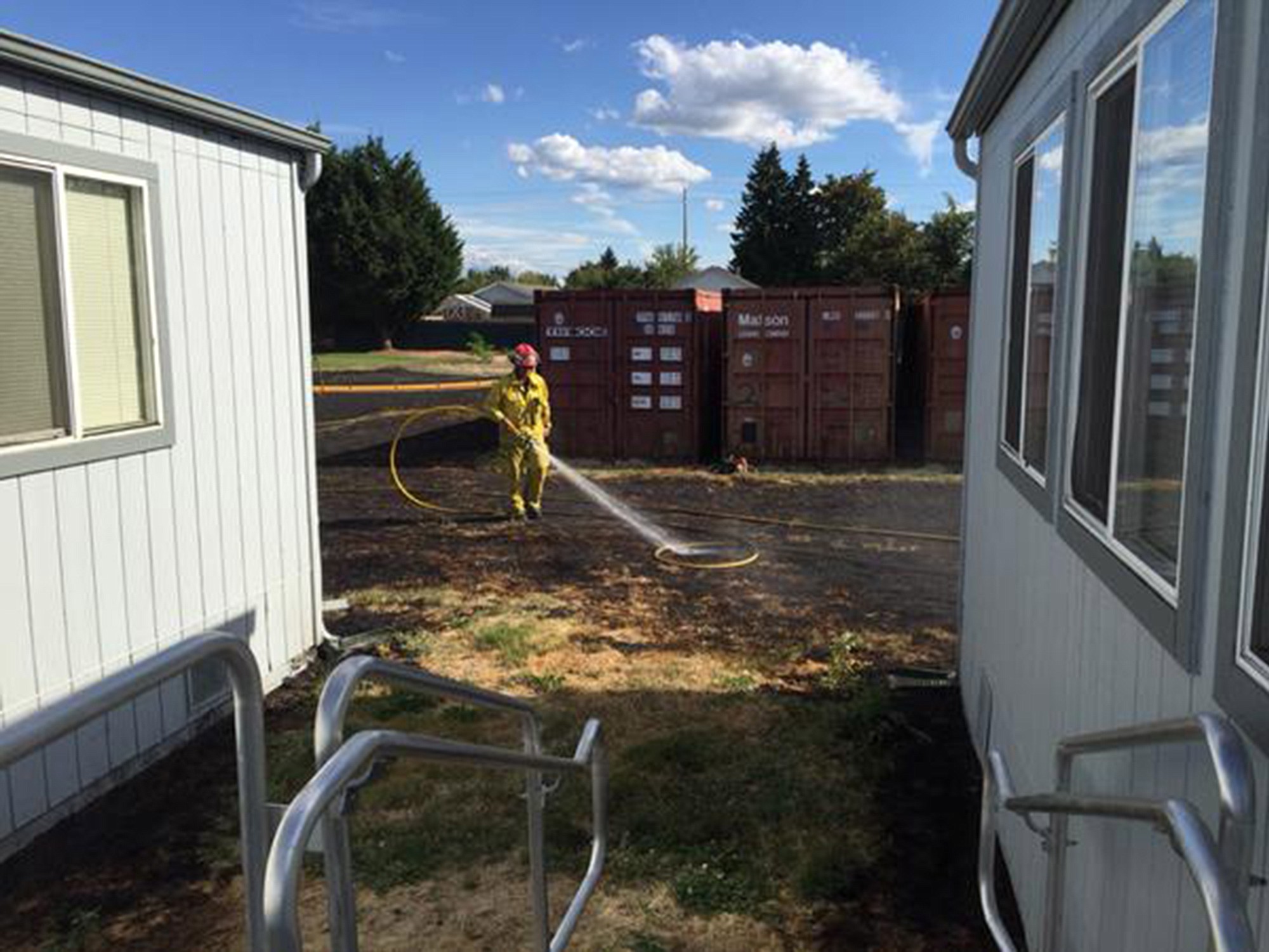 Courtesy of Radar Gossip
Fires on Sunday afternoon at Heritage High School scorched grass and the outside of a portable building. Two juveniles could face charges in the incident, officials said.