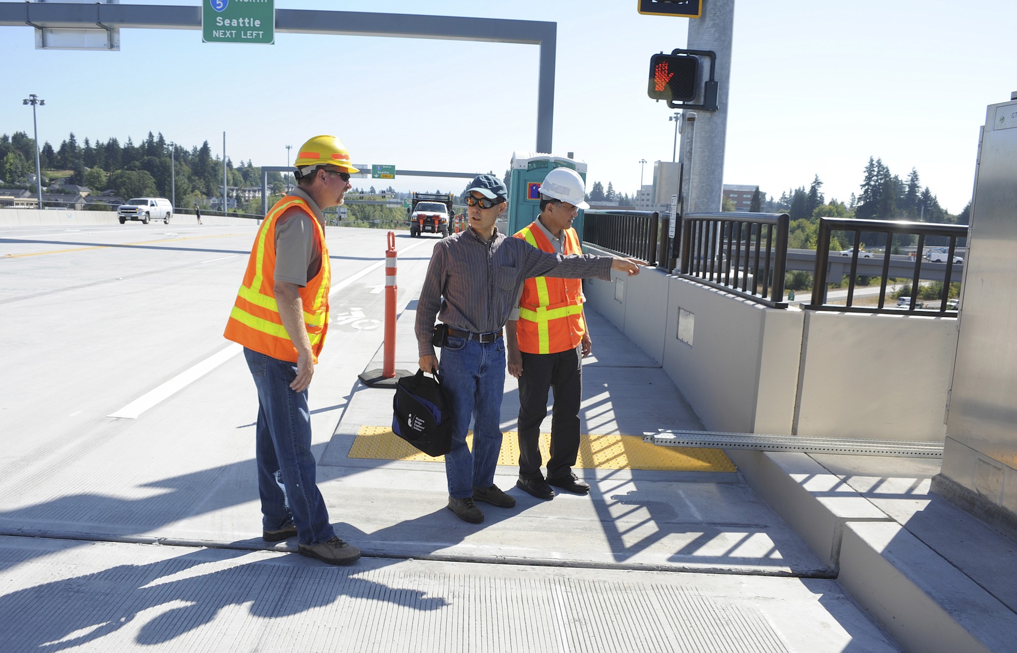 Engineers do some last minute checks as WSDOT opens the new freeway interchange and the NE 139th Street bridge with a ribbon cutting at Salmon Creek in Vancouver  Wa., Wednesday August 27, 2014.
