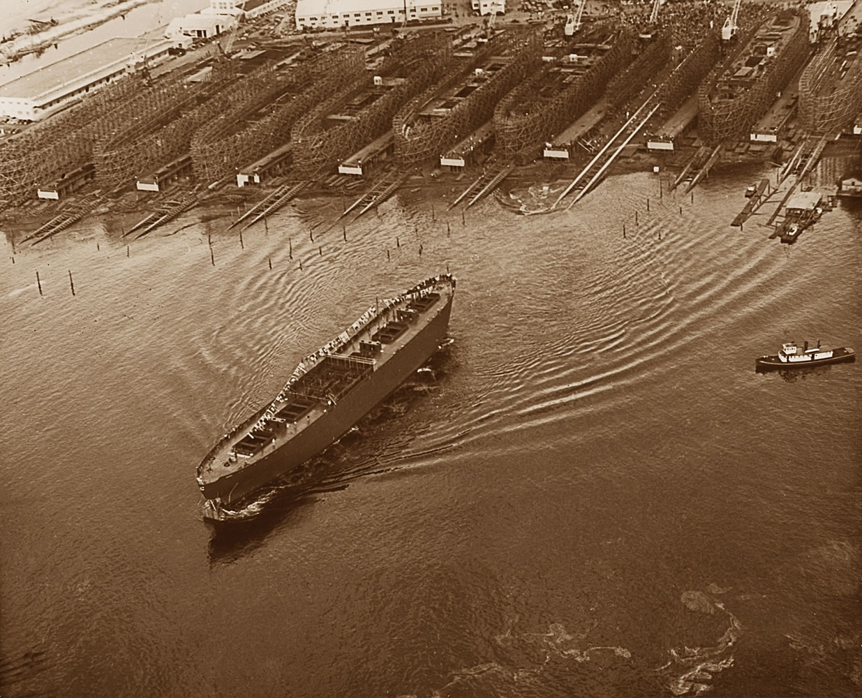Confluence
An aerial photo taken by Lev Richards during the first launching at Vancouver's Kaiser shipyard in 1942.
