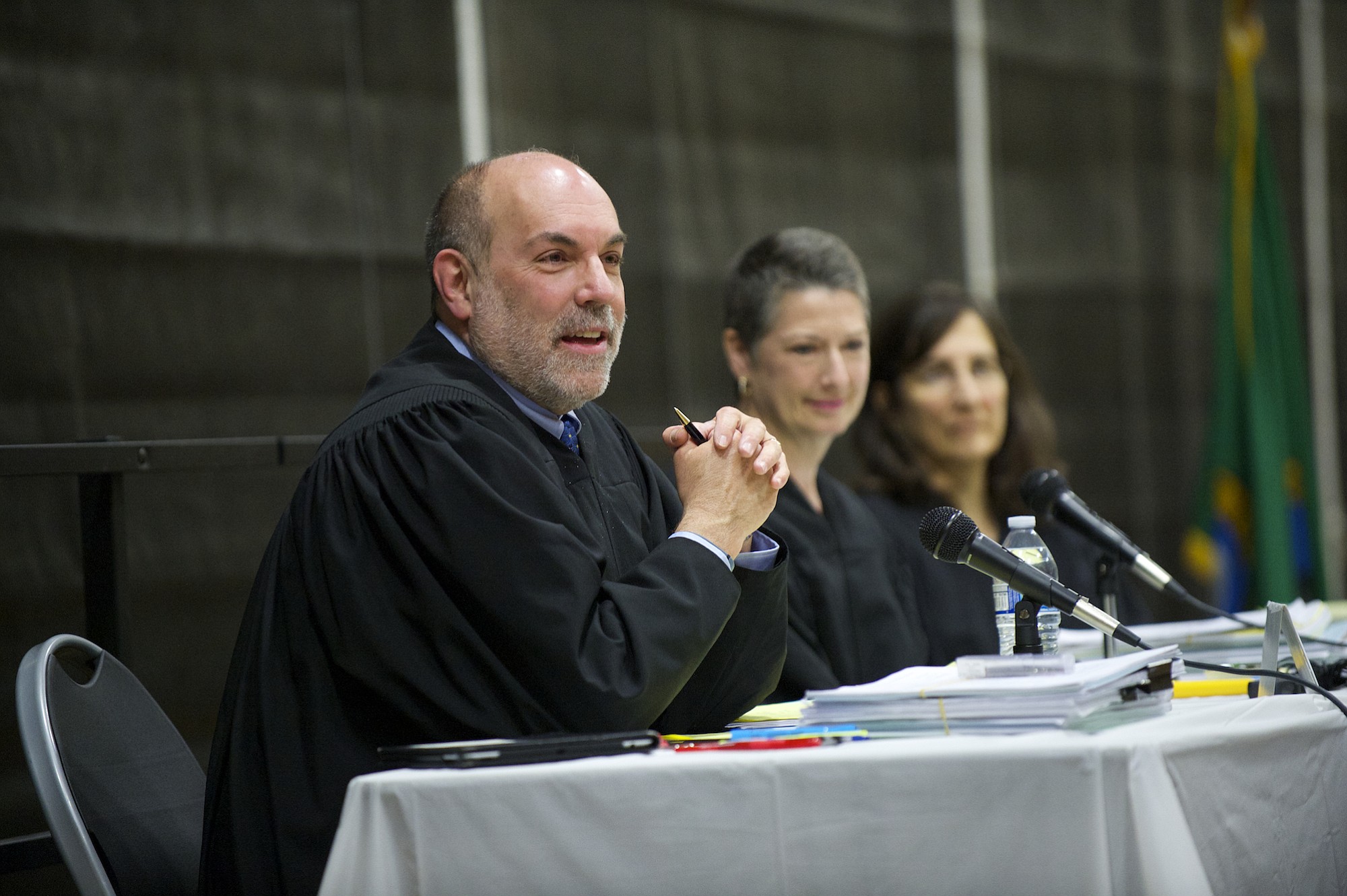 Washington State Court of Appeals Division II judges, from left, Rich Melnick, Jill Johanson and Lisa Worswick hear a local case at Hudson's Bay High School on Monday morning.
