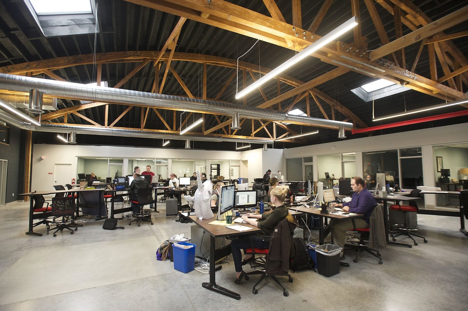 Fuel Medical has retained an open work space and refinished trusses and wood beams in an old Westlie Ford building in downtown Camas.