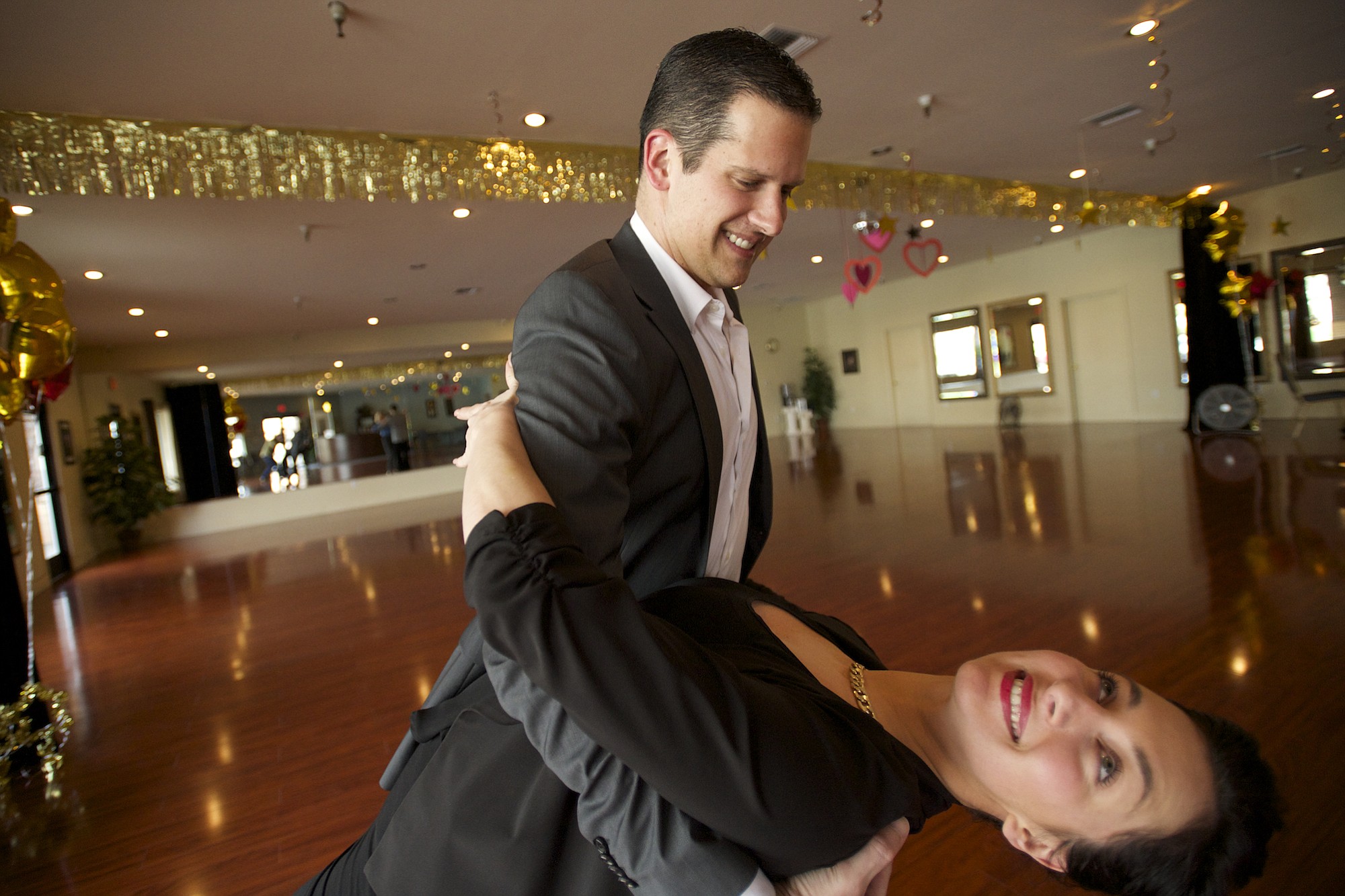 Arthur Murray dance instructor Phil Auer demonstrates his moves with fellow instructor Christina Mullen  in Vancouver.