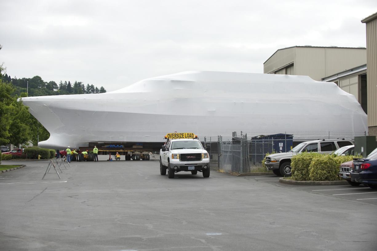 An unfinished 164-foot yacht was  moved from the Christensen Shipyard on Tuesday, and was to be placed on a barge for shipment to a Seattle shipyard for completion. A court-appointed receiver assigned to resolve financial disputes involving the Vancouver yacht builder wants to sell all or most of the company's assents to Tennessee businessman Henry Luken,  who owns 50 percent of the company.