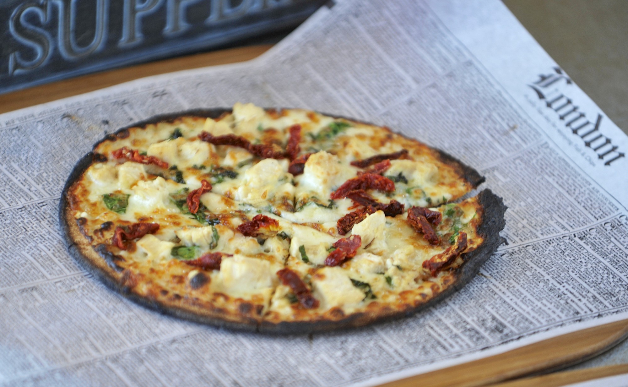 The chicken Mediterranean pizza is served July 14 at Uncle D's Wood Fired Pizza in Battle Ground.