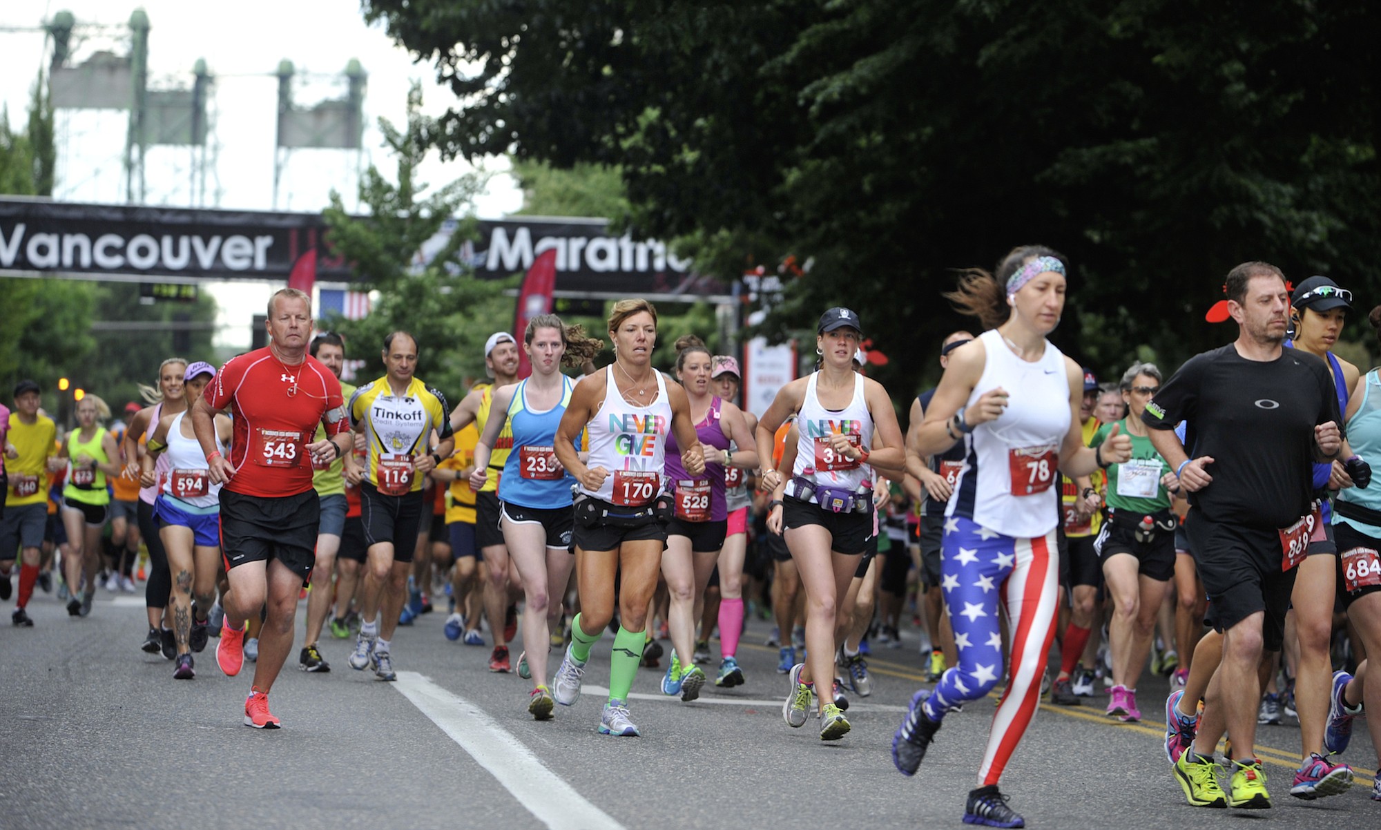 Runners start the Vancouver USA Marathon at Esther Short Park in downtown Vancouver, Wash., on Sunday June 21, 2015.