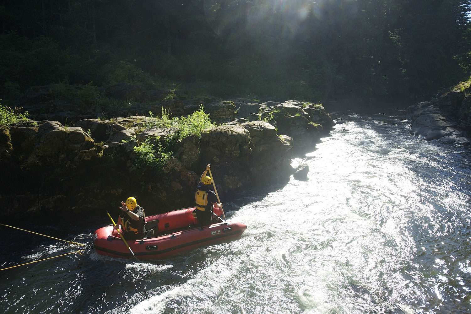 Rescue personnel from North Country EMS search the East Fork Lewis River below Moulton Falls Tuesday afternoon for a man presumed drowned.