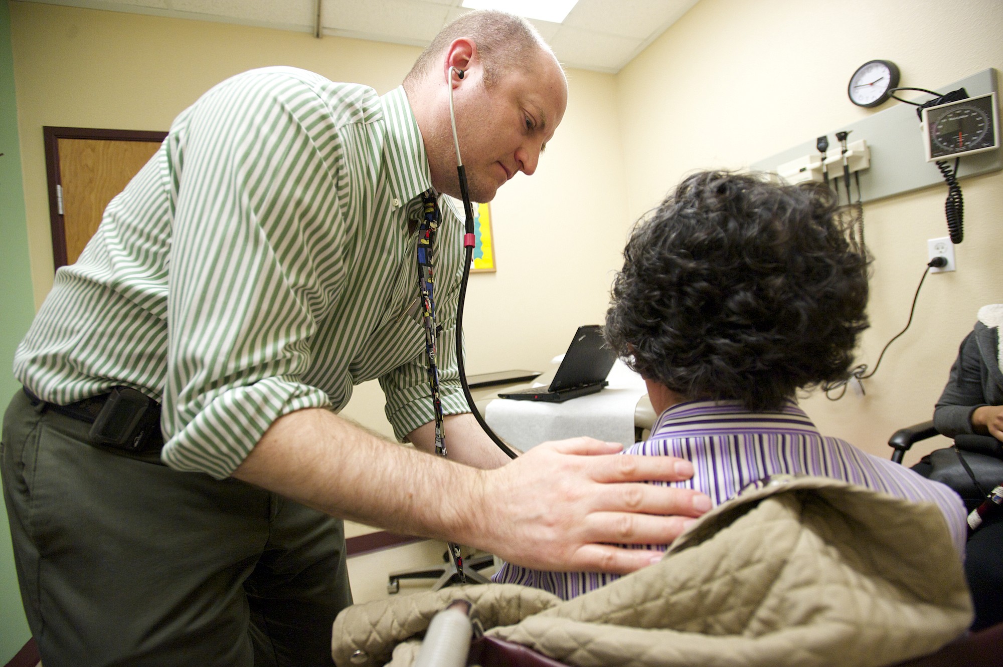 Dr. Tony Stupski cares for a patient Tuesday at Sea Mar Community Health Centers' Vancouver medical clinic.