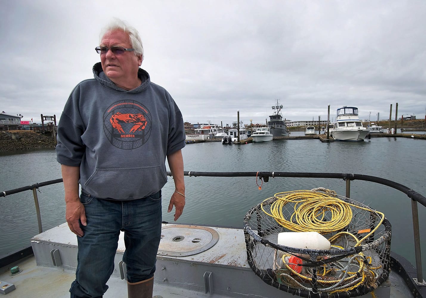 Crab fisherman Larry Thevik discusses his concerns regarding three proposed oil terminal sites in Grays Harbor County on his boat, the Midnight Star, while docked in Westport on Thursday, June 19, 2014.