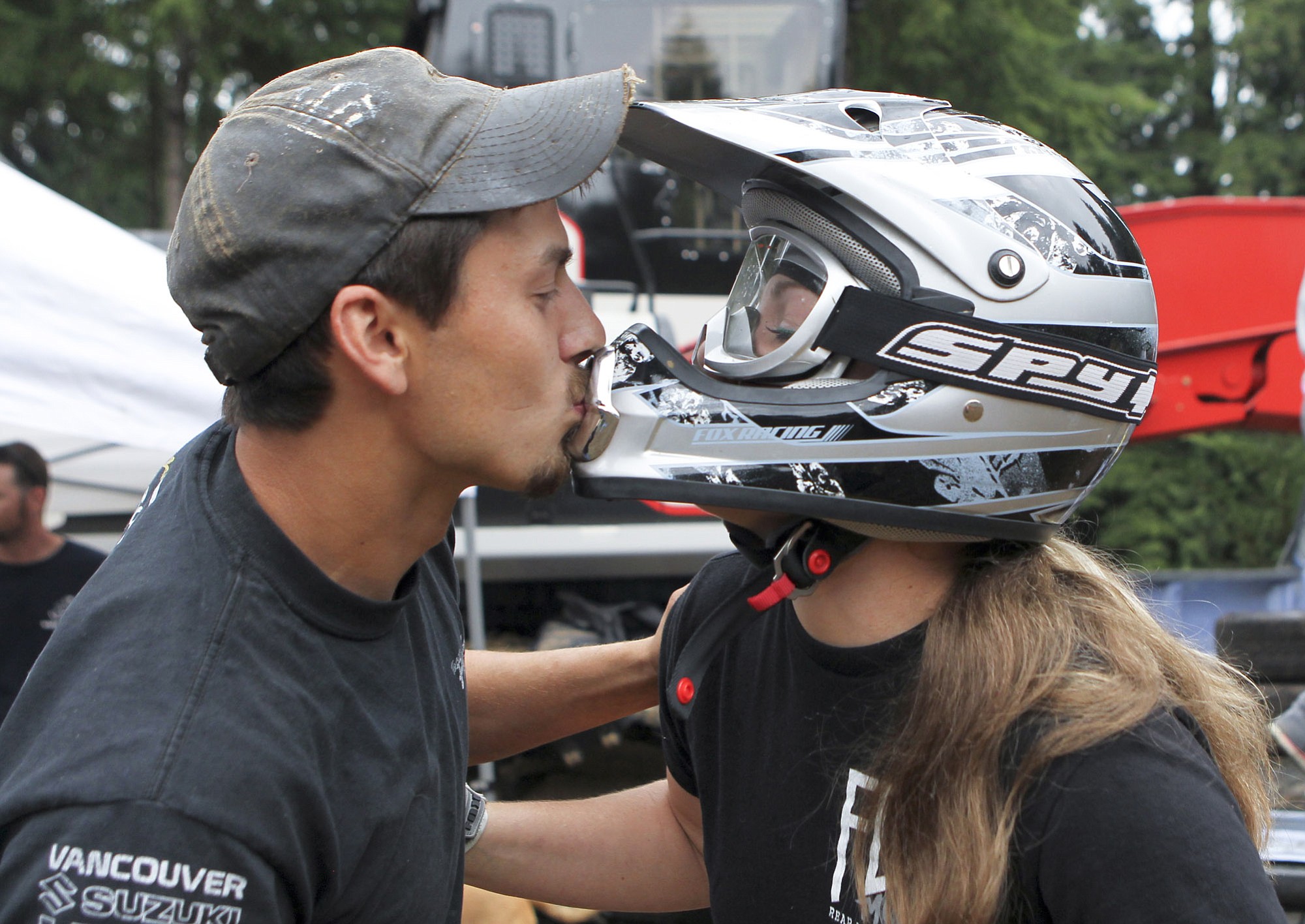 Sarah Kortekaas gets a good-luck kiss from her boyfriend before going for glory during the annual Amboy Territorial Days lawnmower races in 2014.