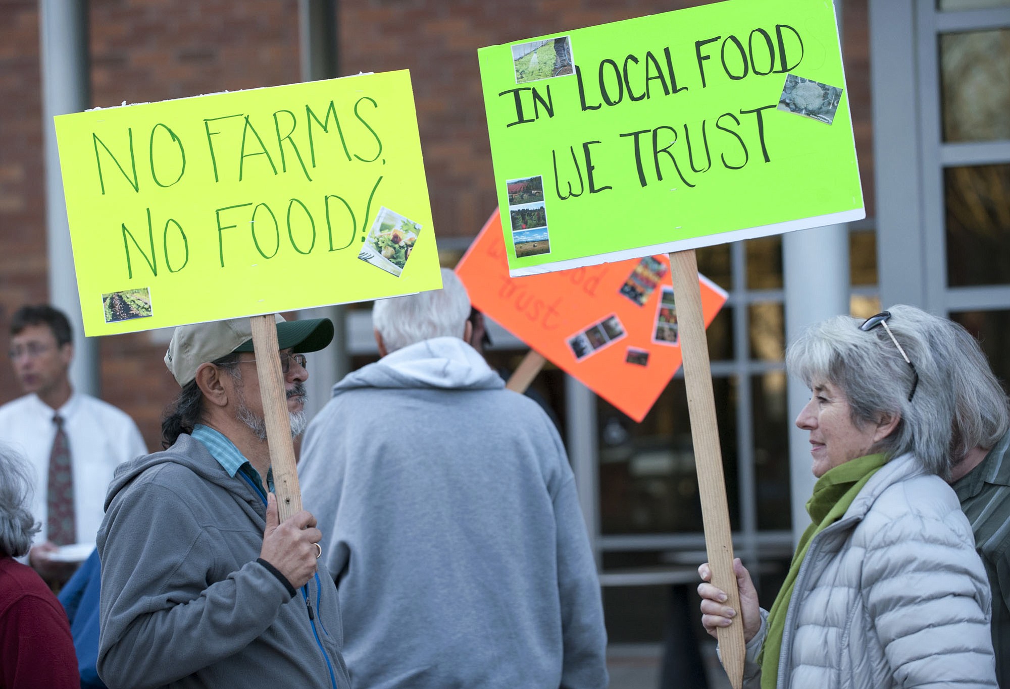 Local farmers and food advocates rally in front of the Clark County Public Service Building prior to Tuesday's council meeting.